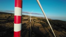 wind power plant technology on the mountains, aerial view fpv