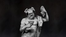 Dionysus Sculpture Sculpture Slow Motion on a Black Background