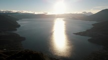 Sunset aerial view of Indian's Nose, Lake Atitlan and surrounding volcanoes in Guatemala.	