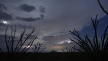 Timelapse of a night thunderstorm over a distant mountain