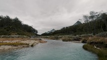 Flowing Esmeralda River Near Ushuaia In Tierra de Fuego National Park In Argentina Patagonia. Wide Shot