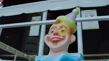 Shaky footage of creepy clown head