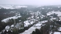 Aerial View of Enniskerry, County Wicklow After Snowfall in the Fog, Ireland
