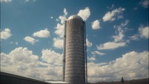 Time-lapse Of Clouds Over Silo