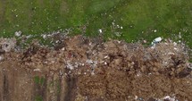  Aerial drone shot of Trash Thrown Away In Nature.