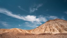 Timelapse of clouds over sandstone mountains in Death Valley