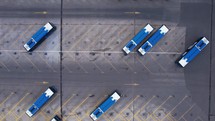 Buses parked in a parking lot