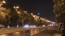 Timelapse of cars on a street in Bucharest, Romania at night.