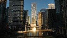 Bright Golden Sun Shining Through Buildings in London at Sunrise