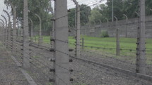Concentration Camp - fence. Pan view. 