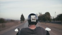 face the road on a motorcycle 