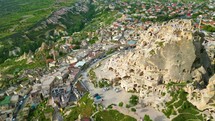Aerial 4k top view of Uçhisar Castle rock in Cappadocia Turkey
