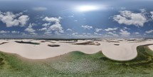 Aerial 360 Large lake in Lençóis Maranhenses at midday on north coast of Brazil