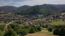 Aerial view of a small town in Germany with houses and green surroundings