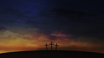 Three crosses on the hill with clouds moving on the starry sky. Easter, resurrection, new life, redemption concept. Seamless looping background 