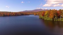 Drone flying over Price Lake in fall 
