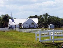 country church with white picket fence 
