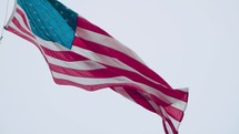 American flag blowing in the wind 