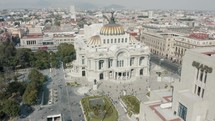 Tourists Walking Outside The Palacio de Bellas Artes In The Historic Center Of Mexico City. - aerial	