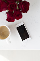 iPhone with coffee mug 