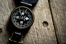 compass on wood background 