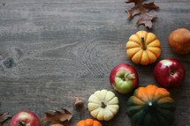 fall background with pumpkins and fruit 