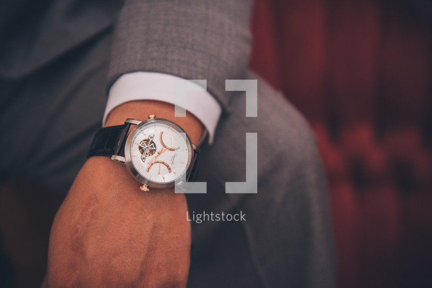 wrist watch on a groom 
