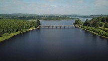 Aerial View Approaching Baltyboys Bridge with Traffic and Speed Boat, Blessington, County Wicklow, Ireland