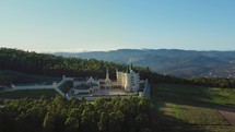 Beautiful drone shot of religious gothic school in South America`s countryside