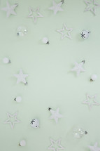 white ornaments on mint green 