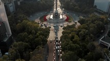 The Angel of Independence at Paseo de la Reforma in Downtown Mexico City - aerial drone shot	
