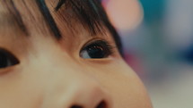 Close-up of little Asian girl
