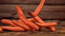 Fresh carrots . Filmed is slow motion 1000 fps.
