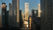 Bright Golden Sun Shining Through Buildings in London at Sunrise