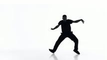 a man break dancing in slow motion 