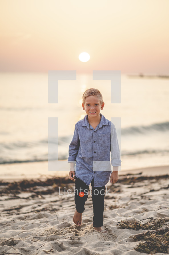 portrait of a little boy on a beach 