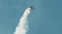 Skybound Stunt Plane Extravaganza. Stunt plane flies in the sky