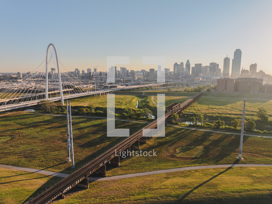 Aerial view of the Margaret Hunt Hill Bridge in downtown Dallas, Texas on a beautiful clear blue sky morning