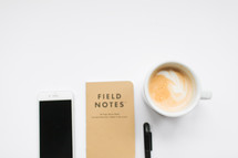 iPhone, field note book, pen, latte 
