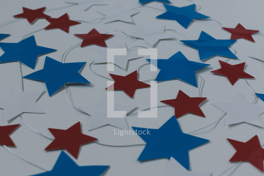 red, white, and blue stars on string 