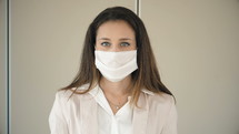 businesswoman wearing a face mask 