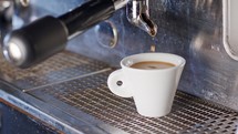 Espresso machine preparing a cup of espresso coffee.