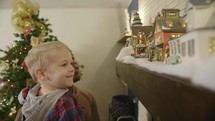 a child admiring Christmas decorations 