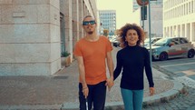couple walking together in a city 