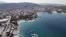 Aerial View Of Stunning Ksamil Riviera In Albania. Circle Dolly, Establishing Shot