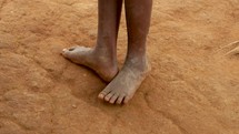 walking barefoot in Uganda 