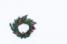 Christmas wreath against a white background 