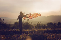 young woman with an American flag