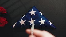 Military plate on the folded american flag for memorial day