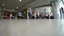 Time lapse of people with luggage in an airport in Thessaloniki, Greece.